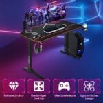 Ergonomiško dizaino žaidimų stalas su integruota USB įkrovimo stotele (Juoda)