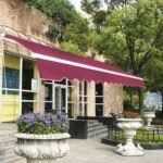 Tiesiamoji markizė su rankiniu valdymu atspari UV spinduliams ir vandeniui (Vyšninė)