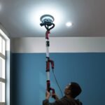 Elektrinis sienų ir lubų šlifuoklis su LED apšvietimu ir dulkių siurbimo sistema (Juoda)