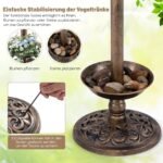 Vandens telkinys su saulės šviesa ir gėlių vazonais (Bronzos)