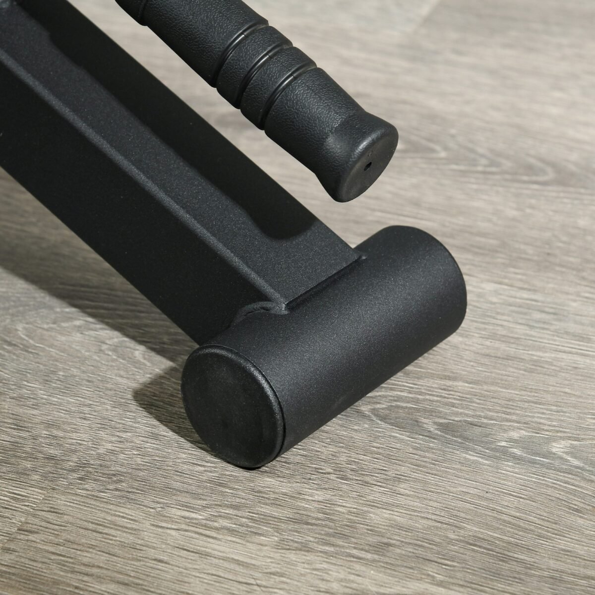 Hantelio keliklis su neslystančia rankena