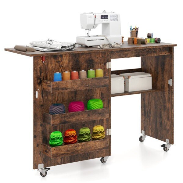 Sulankstomas siuvimo stalas su ratukais ir laikymo vietomis (Ruda)