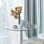 Apvalus valgomojo stalas su stikliniu stalviršiu ir metaliniu rėmu