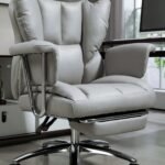 Ergonominė biuro kėdė su kojų atrama ir atlenkiamu atlošu
