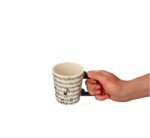 Keramikinis puodelis su muzikiniu motyvu