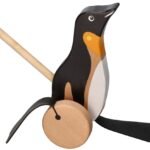 Stumiamas medinis pingvinas