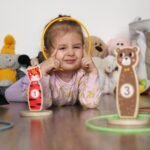 Medinis mėtymo žaidimas su gyvūnėlių stulpeliais