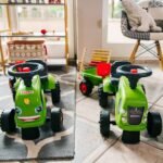 Stumiamasis traktoriukas Baby Claas žalias su priekaba ir priedais