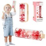 Medinė lietaus lazdelė su raudonais kamuoliukais