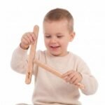 Medinės muzikinės lazdelės muzikiniam lavinimui