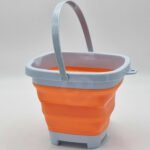 Sulankstomas oranžinis kvadratinis silikoninis kibiras